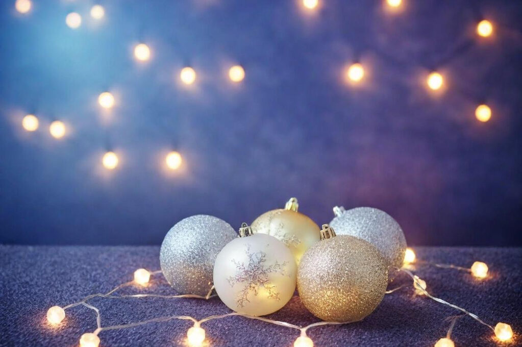 Holiday Sampler Image, round balls and white lights on purple gradient background